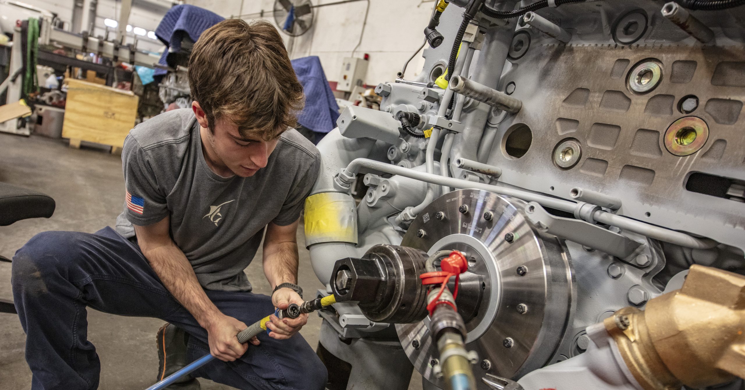 technician working on marine engine