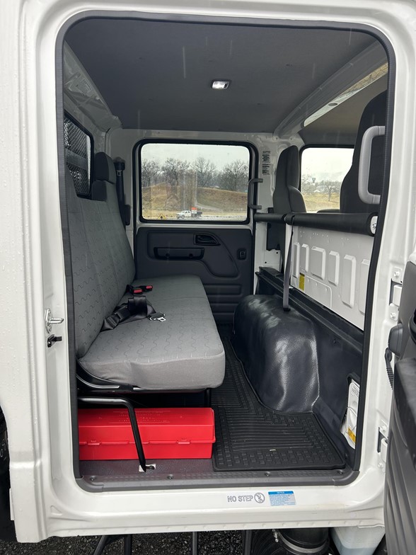2025 Isuzu NPR-HD crew cab diesel with a 17ft PJ's open landscape body. 11006156008
